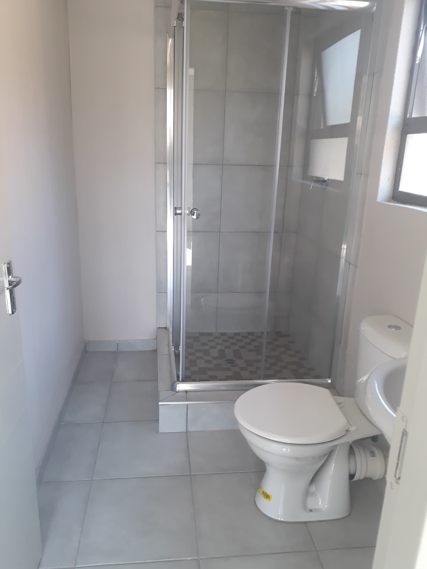 Shower and tiles scrubbed down